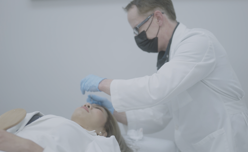 Dr. OConnell giving patient botox injection